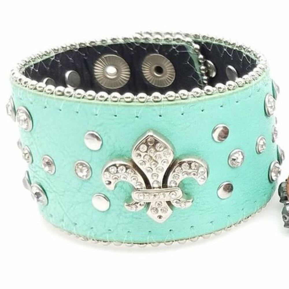 Turquoise leather cuff.